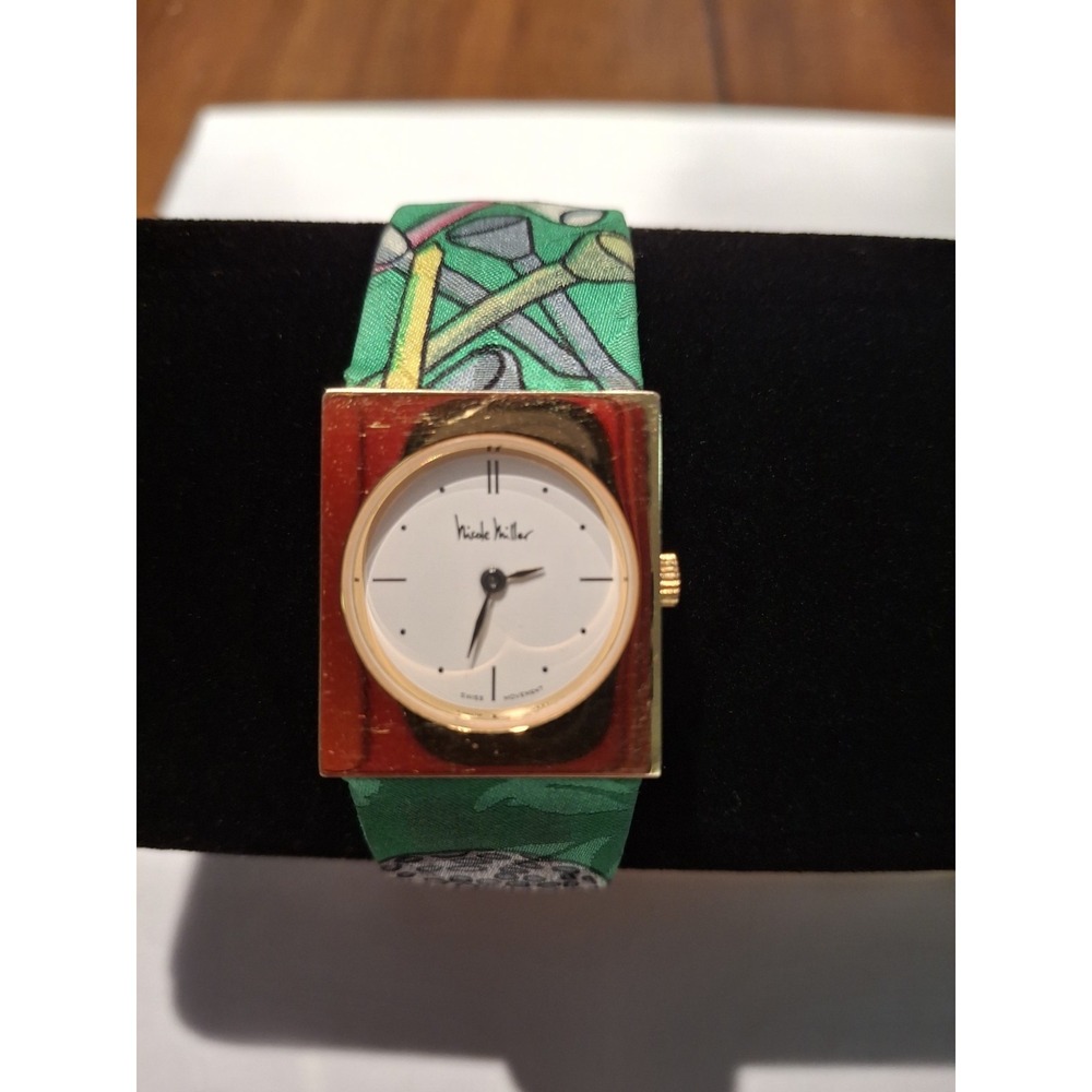 Nicole Miller Ladies Watch. Green Band. Great For The Golf Enthusiasts!